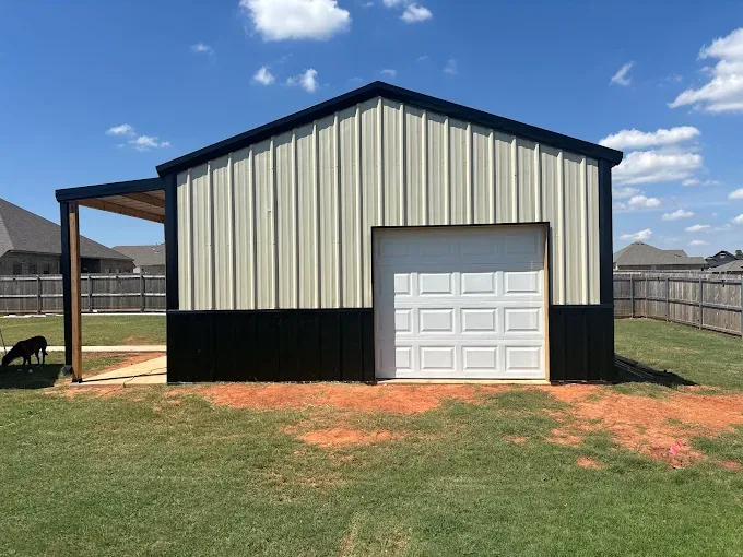White garage door on metal shop building installed by Affordable Door Co in OKC metro